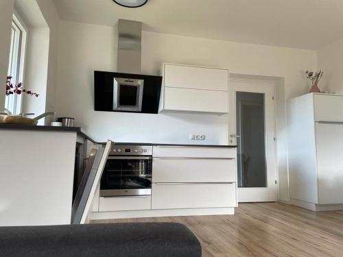 Una cocina o zona de cocina en Apartments Torggl