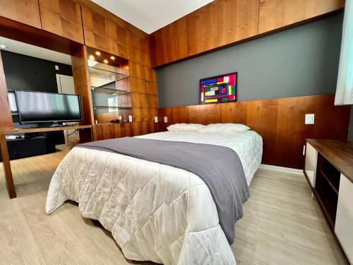 Ένα ή περισσότερα κρεβάτια σε δωμάτιο στο Flat em região nobre