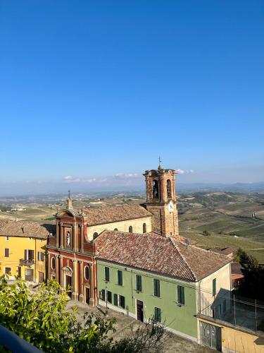 a building with a clock tower on top of it at GABRY GUEST HOUSE in Bruno