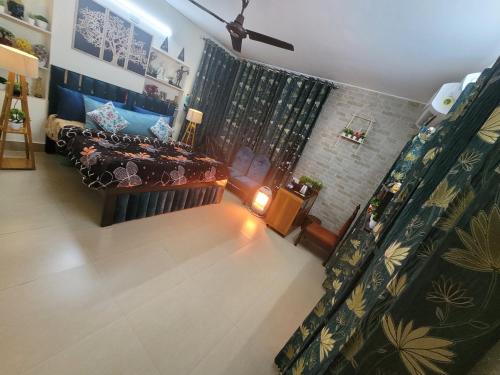 an aerial view of a living room with a couch at Dhairya's Villa Home Away From Home in Jammu