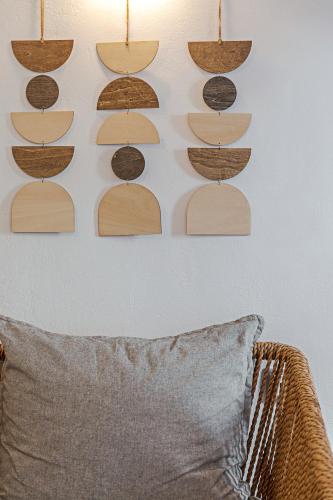 a wall with a bunch of surfboards on a wall at Helianthus Dream Homes in Oia
