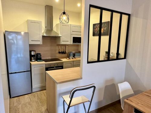Kuchyňa alebo kuchynka v ubytovaní Appartement à 15min de paris