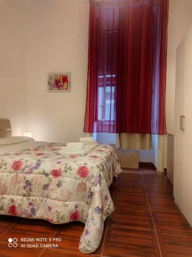 Säng eller sängar i ett rum på Nella Storica Piazza Carlo III