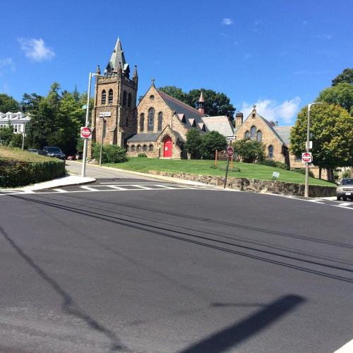 a church with a clock tower on a street at Private Room in a Grand House in Boston
