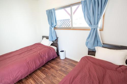 Кровать или кровати в номере HIKARI DOME - Vacation STAY 89725v