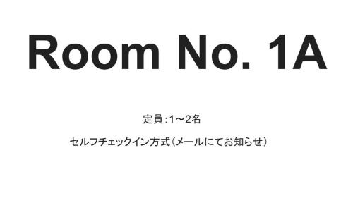 a sign that reads room no in korean text at Enzo Due in Tamano