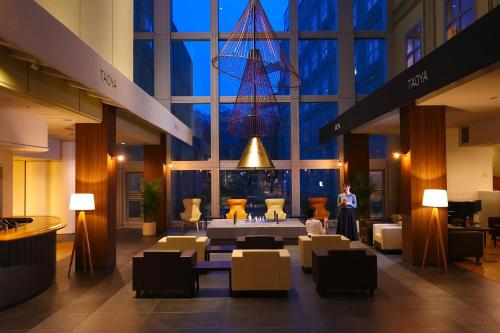 a man standing in the lobby of a building at TAOYA Nikko Kirifuri in Nikko