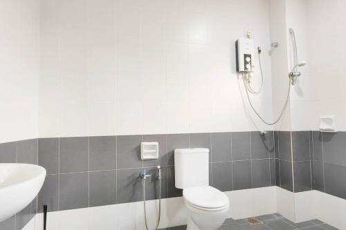 a bathroom with a shower and a toilet and a sink at Equine Park Landed H.stay-Farm in the City-12Pax in Seri Kembangan