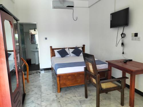 TV a/nebo společenská místnost v ubytování Hotel Sun Blue