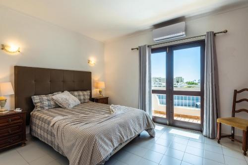 Кровать или кровати в номере Villa Canto II - 500m from the Beach - Private Swimming Pool - Wi Fi