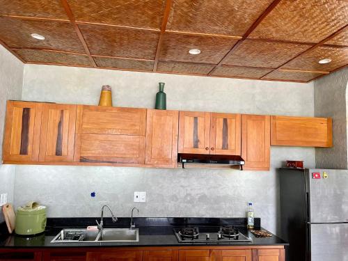 Η κουζίνα ή μικρή κουζίνα στο Bon Sand Villa & Spa Hoi An