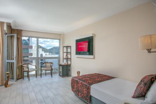 Postel nebo postele na pokoji v ubytování Arbatt Marmaris Hotel