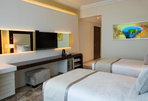  Elite Byblos Hotel -  Room  picture :   Minibar    Shower    Bath                           