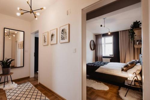 Ένα ή περισσότερα κρεβάτια σε δωμάτιο στο Loft apartment with balcony in centre