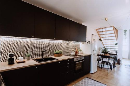 Η κουζίνα ή μικρή κουζίνα στο Loft apartment with balcony in centre