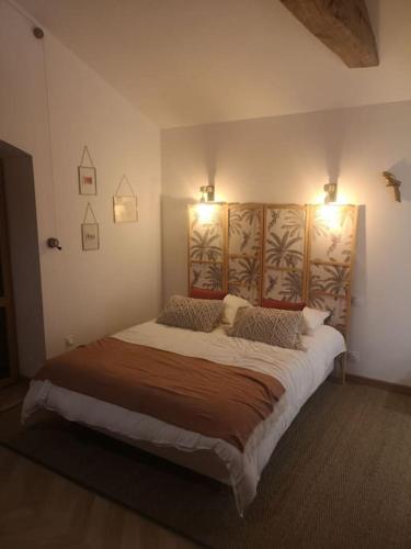 Postel nebo postele na pokoji v ubytování Chambre d'hôtes de caractère en campagne