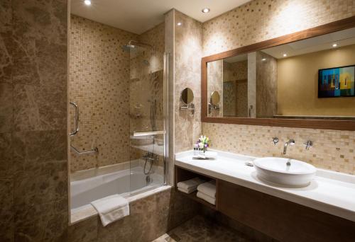  Elite Byblos Hotel -  Room  picture :   Minibar    Shower    Bath                           