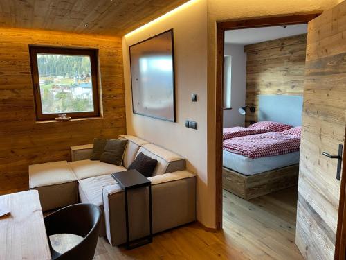 Postel nebo postele na pokoji v ubytování Exclusives Apartment im Sonnenhof Moos