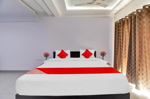 Krevet ili kreveti u jedinici u okviru objekta Flagship Kavish Residency