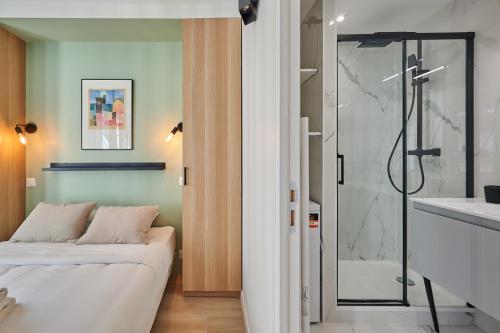 Kúpeľňa v ubytovaní Residence Center of Paris by Studio prestige