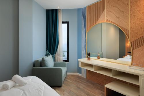 Postel nebo postele na pokoji v ubytování Hotel Brilant Saranda