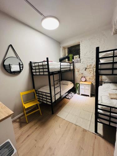 Postel nebo postele na pokoji v ubytování Ofek's place - Midtown TLV