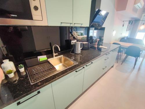 Dapur atau dapur kecil di Social Lodge - Happiness