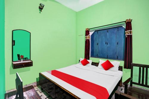 Cama ou camas em um quarto em Flagship Hotel Elvis Guest House