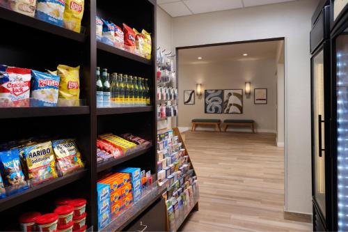 a store aisle with food and drinks at Residence Inn Austin South in Austin