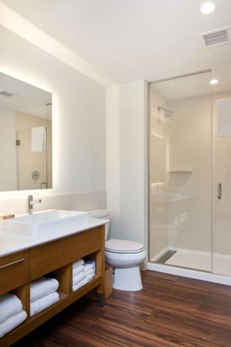a bathroom with a sink and a toilet and a shower at Element Chattanooga East in Chattanooga
