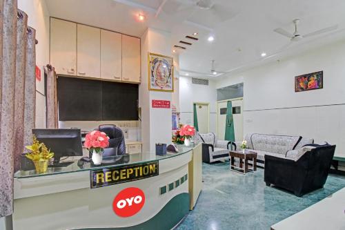 a reception area of a hospital with a reception desk at Hotel Sunshine Inn in Nagpur
