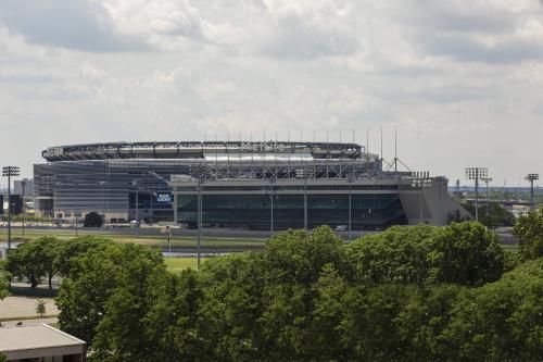 a large football stadium with a building in it at SpringHill Suites by Marriott East Rutherford Meadowlands Carlstadt in Carlstadt