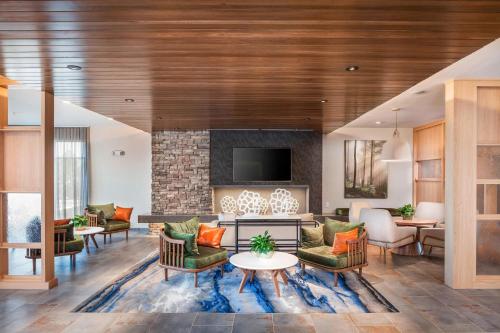 a living room filled with furniture and a fireplace at Fairfield Inn & Suites by Marriott Lebanon in Lebanon