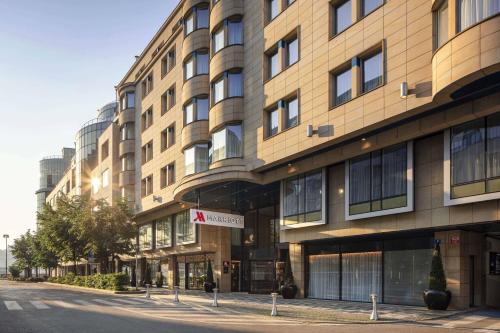 a large building on the side of a street at Prague Marriott Hotel in Prague