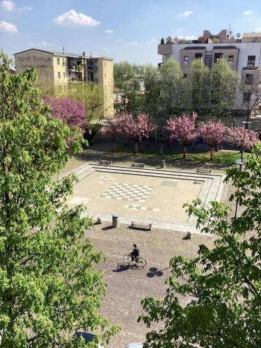 a person riding a bike in a park at Diego's Apartment - Monza Park in Biassono