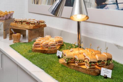 a group of sandwiches on display on a table at Miami Airport Marriott in Miami