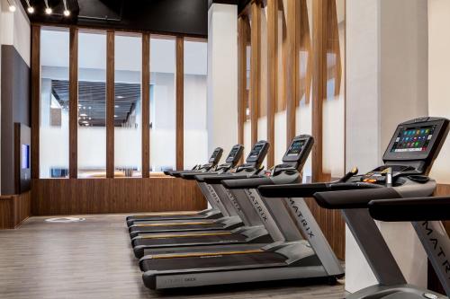 a row of treadmills in a gym at Odessa Marriott Hotel & Conference Center in Odessa