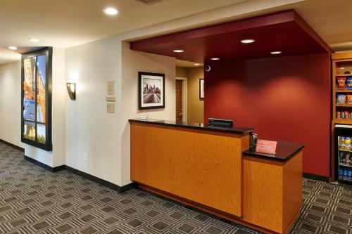 a lobby with a reception desk in a hospital at TownePlace Suites by Marriott Minneapolis Downtown/North Loop in Minneapolis