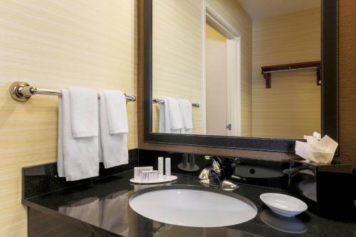 a bathroom with a sink and a mirror at Fairfield Inn & Suites by Marriott Yuma in Yuma
