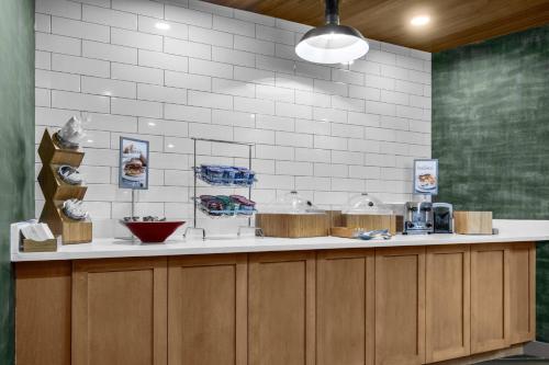 a kitchen with a counter with pots and pans at Fairfield Inn & Suites Rocky Mount in Rocky Mount