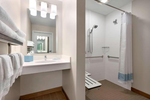 a bathroom with a sink and a shower at TownePlace Suites by Marriott Pittsburgh Airport/Robinson Township in Robinson Township