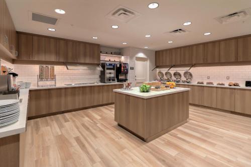 a large kitchen with a island in the middle of it at Residence Inn by Marriott Pigeon Forge in Pigeon Forge