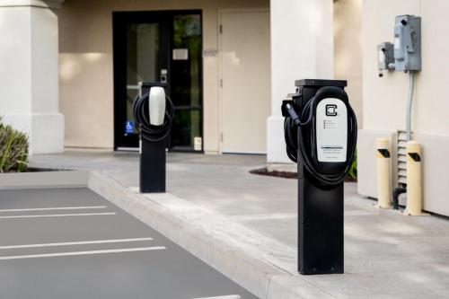 two parking meters in front of a building at SpringHill Suites by Marriott Modesto in Modesto