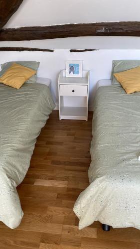 Postel nebo postele na pokoji v ubytování VILLA OLIMAR