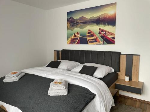 En eller flere senge i et værelse på - SANO Apartments - Stilvoll - Ruhig - Platz zum Arbeiten