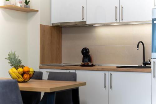 Kuchyň nebo kuchyňský kout v ubytování Koti apartman Zlatibor