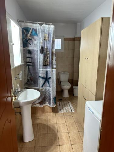 A bathroom at Archontia Apartment