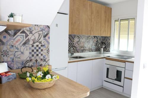 Η κουζίνα ή μικρή κουζίνα στο Duplex Avenida