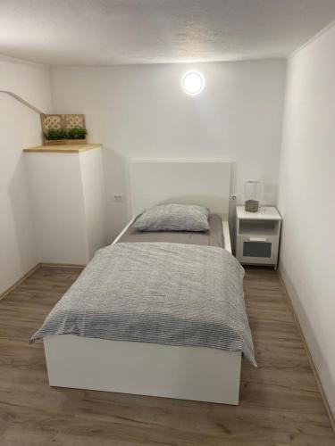 Postel nebo postele na pokoji v ubytování Apartma Stres