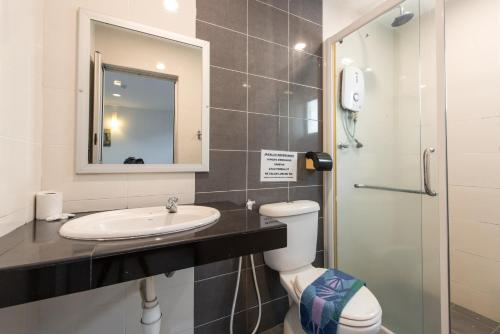 Koupelna v ubytování Hollitel Hotel